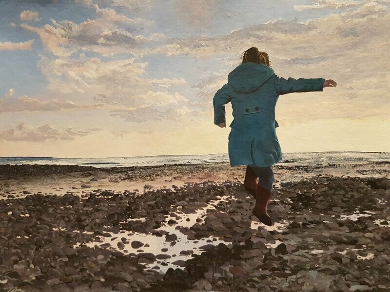 A girl jumping over rock pools