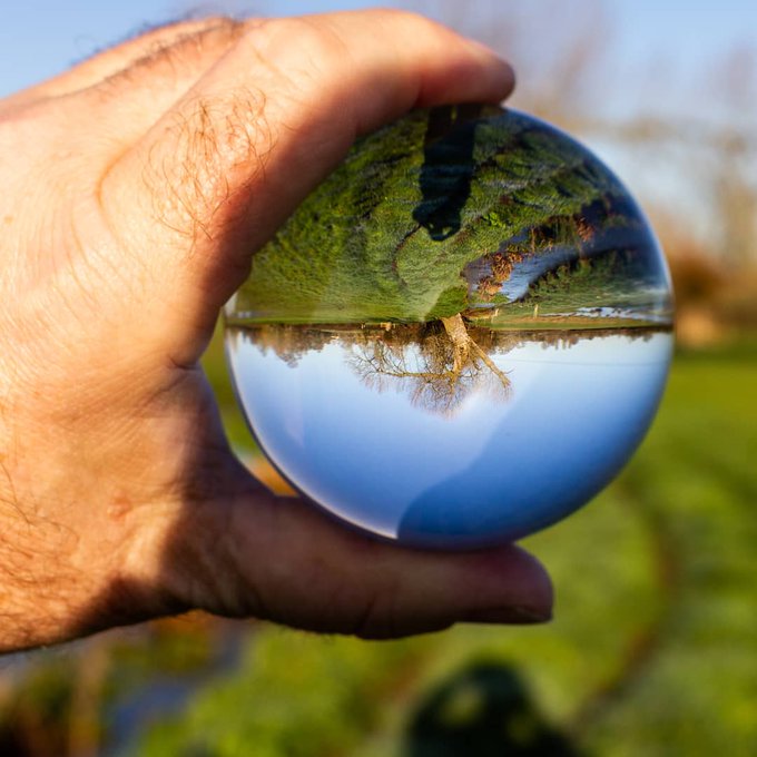 A glass sphere with images