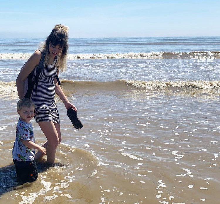 Wendy and toddler Alex in the sea