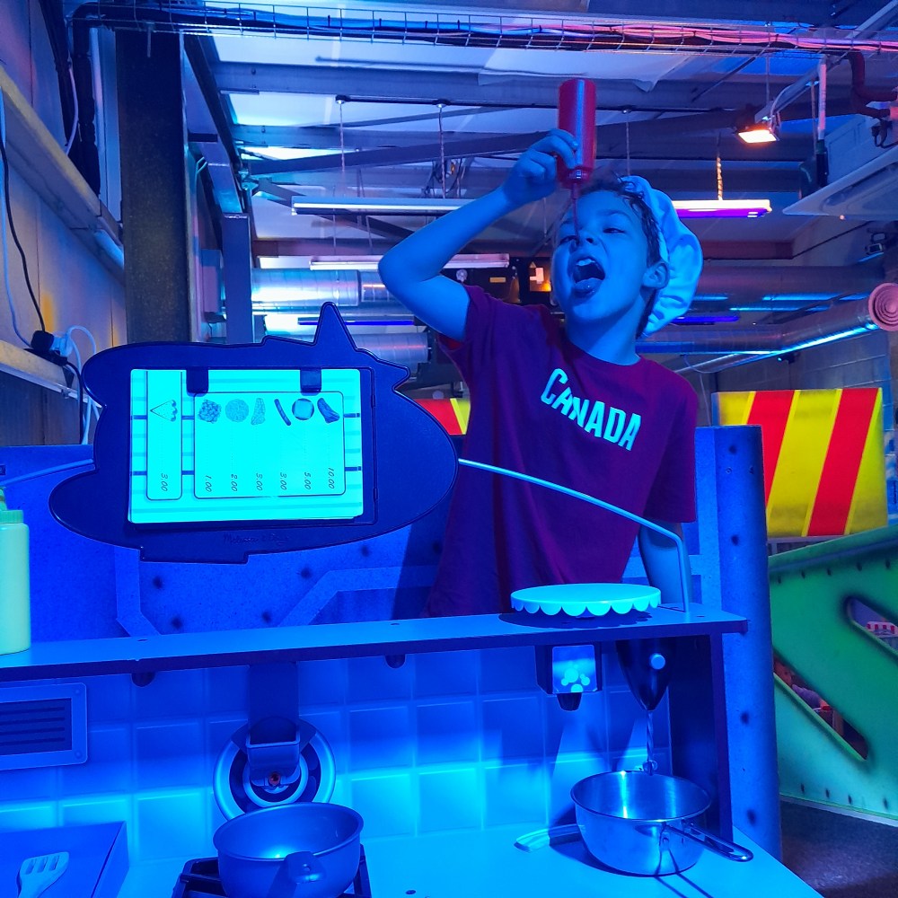 Space adventure an enthusiastic 8 year old chef in the role play zone